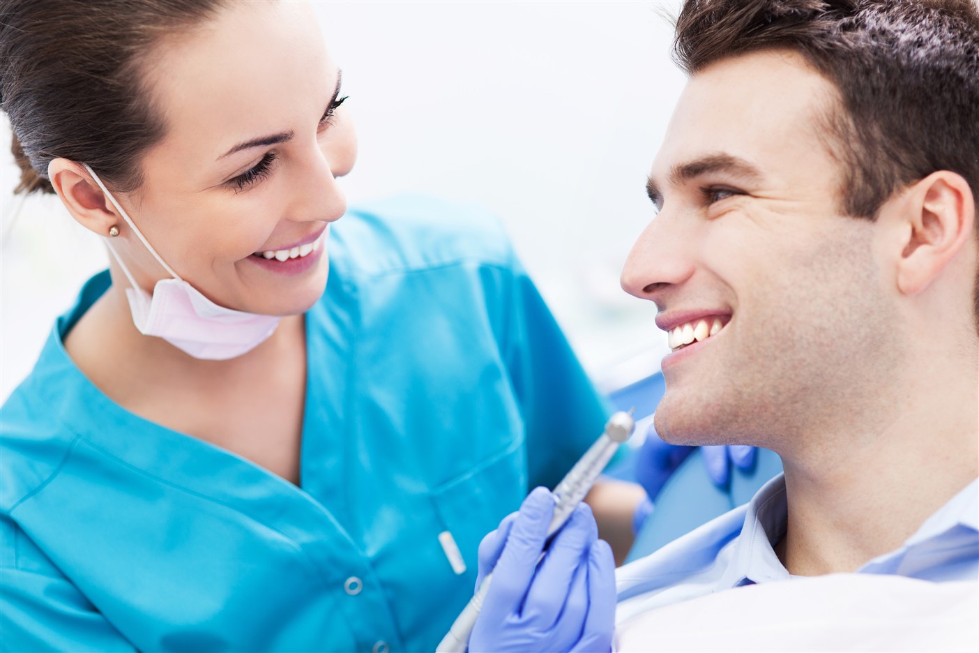 A dental hygiene patients gets his teeth cleaned by a certified hygienist