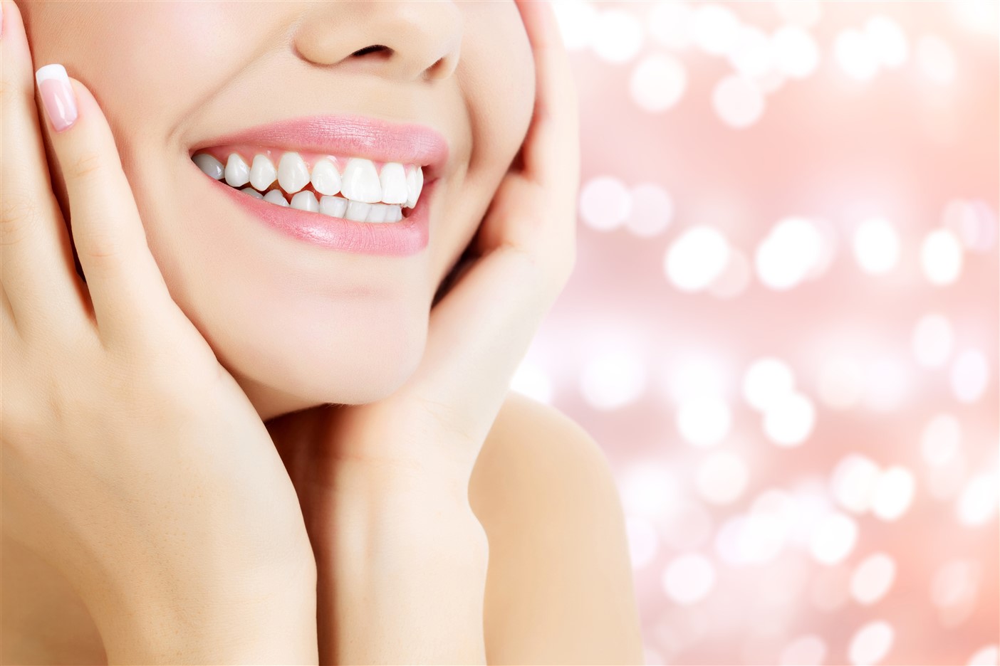 A woman with a bright radiant smile from teeth whitening