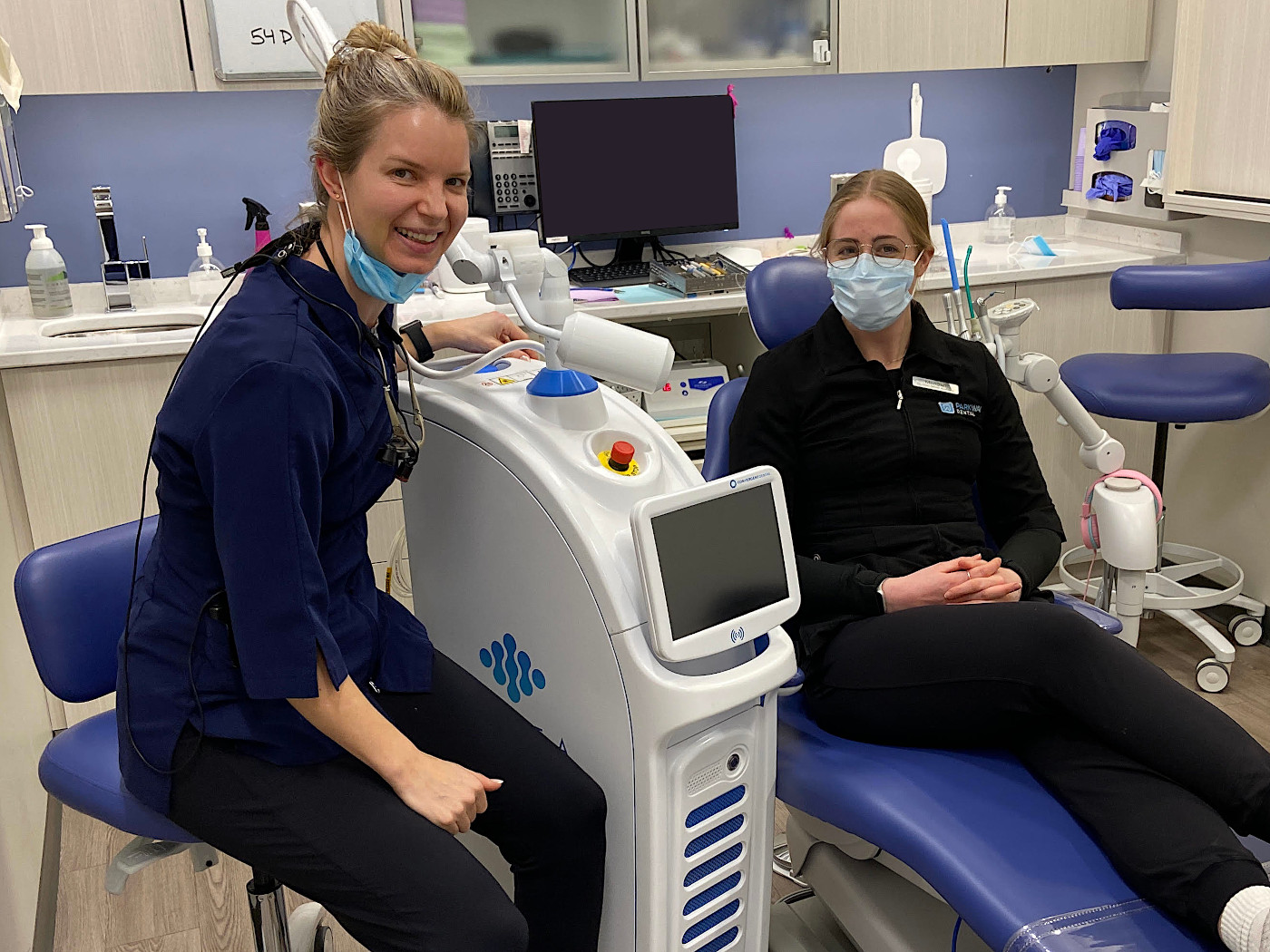 Dr. Turner and staff show off the laser dentistry machine at Parkway Dental in Victoria